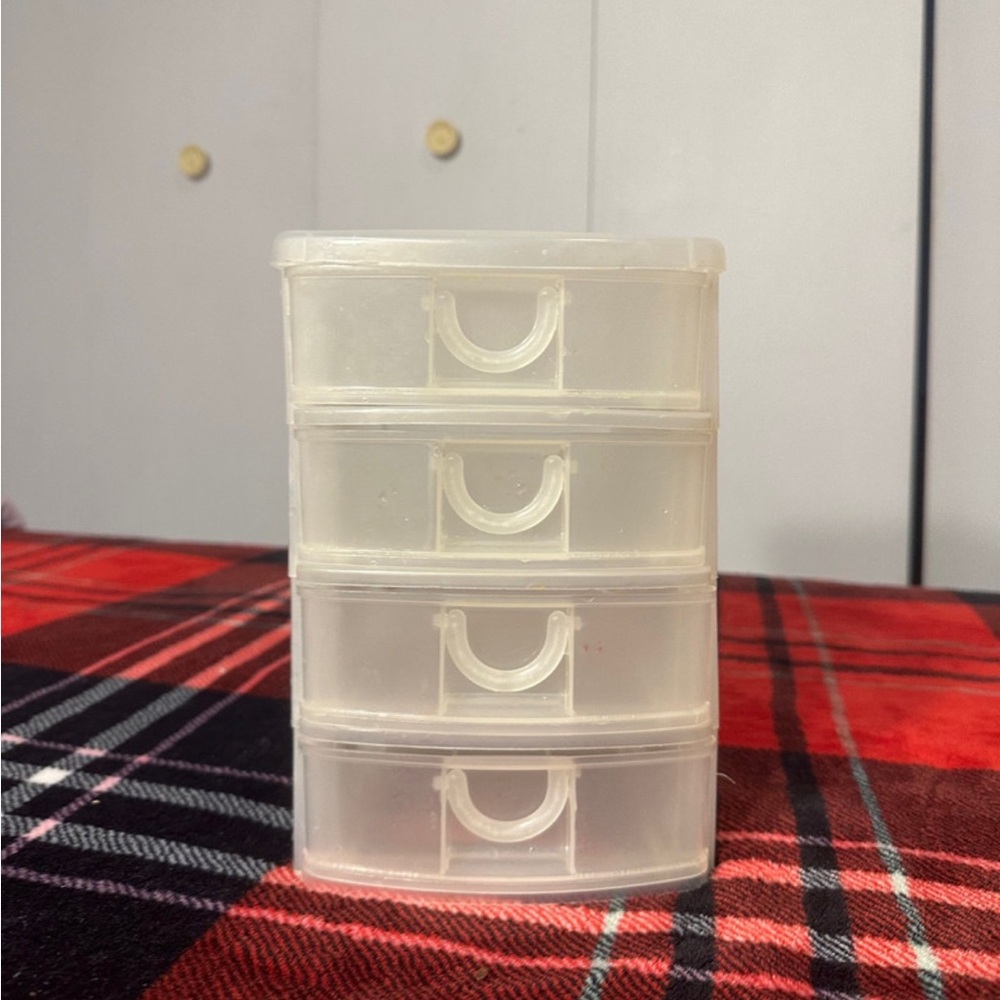Small clear storage holder for stationary office items
